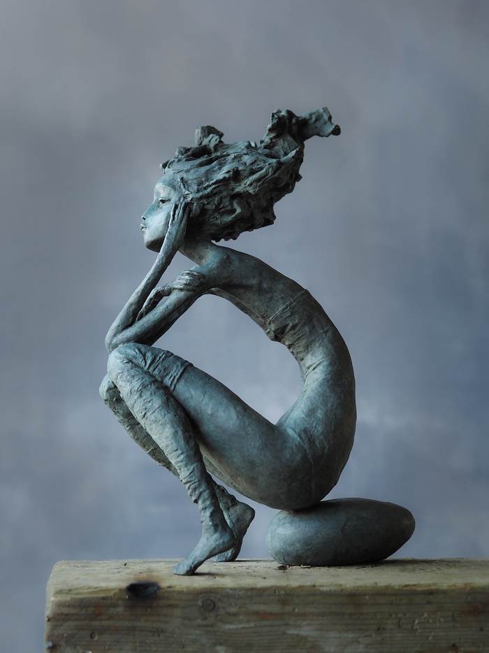 Bronze Sculpture of A Woman: the Artist Tells the Stories of Women Through Body Language and Flowing Hair